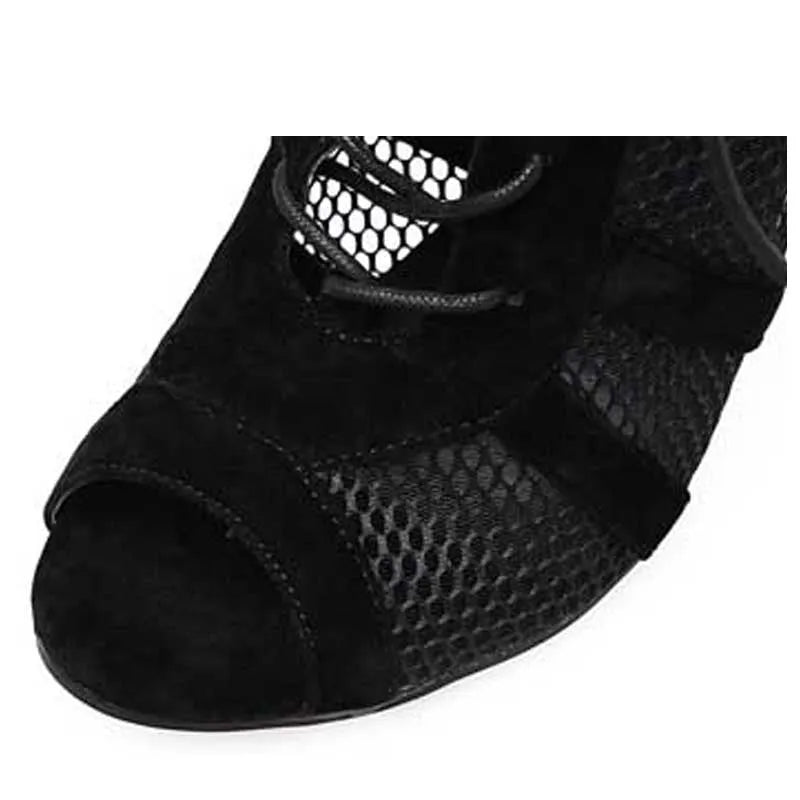 Black suede women's lace-up high heel shoes with a stiletto heel on a white background.