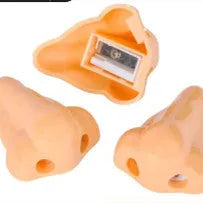 Flesh colour plastic pencil sharpener showing geometry shape and big nostril opening