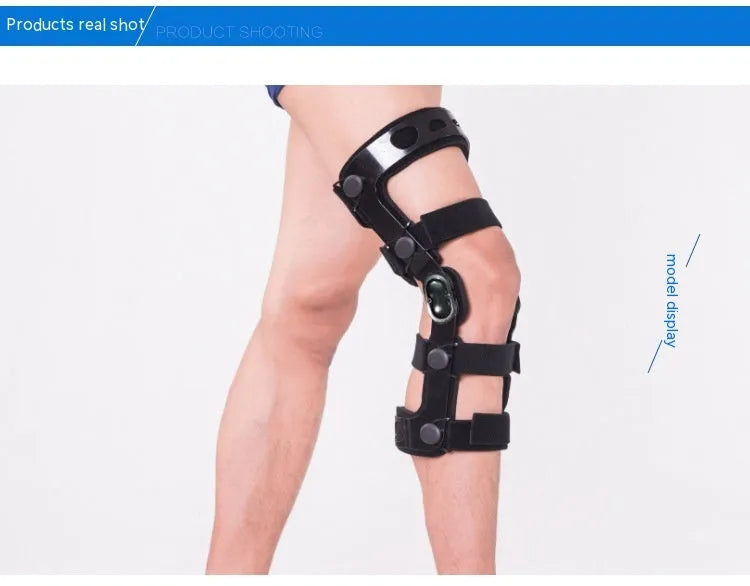 Black anterior ligament knee pad with plastic hinge components and sponge padding