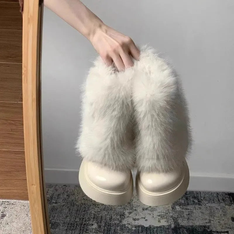 Women's black fleece-lined snow boots with waterproof rubber platform sole