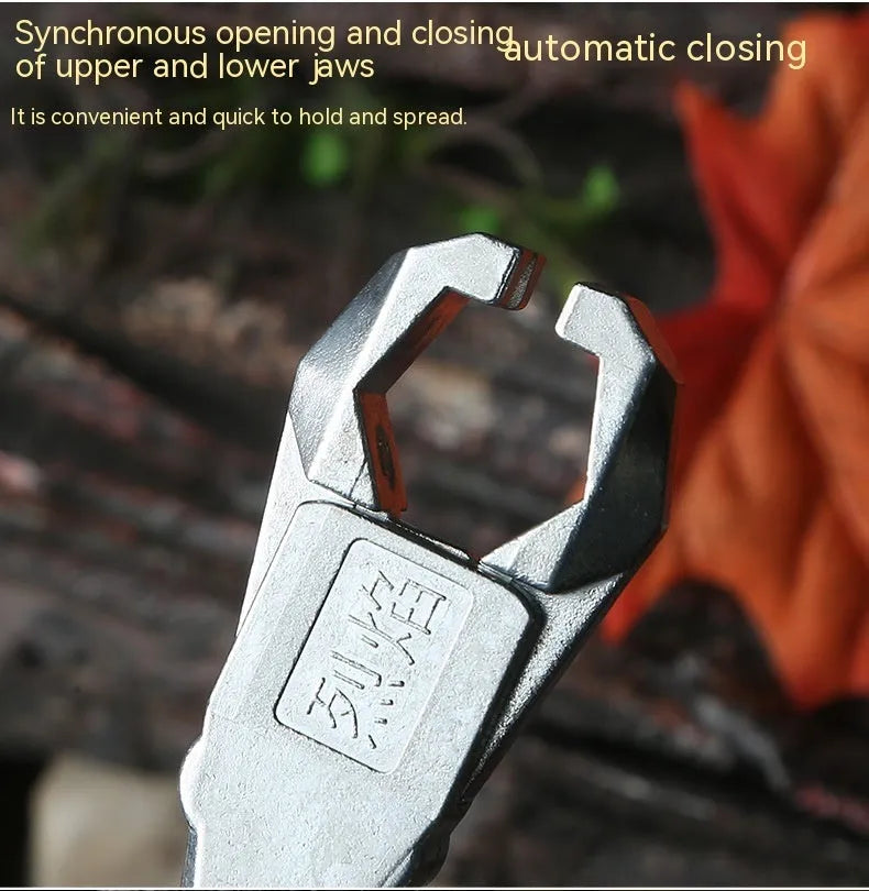 Close-up of a zinc alloy archery release aid showing its two-axis harpoon clip mechanism.