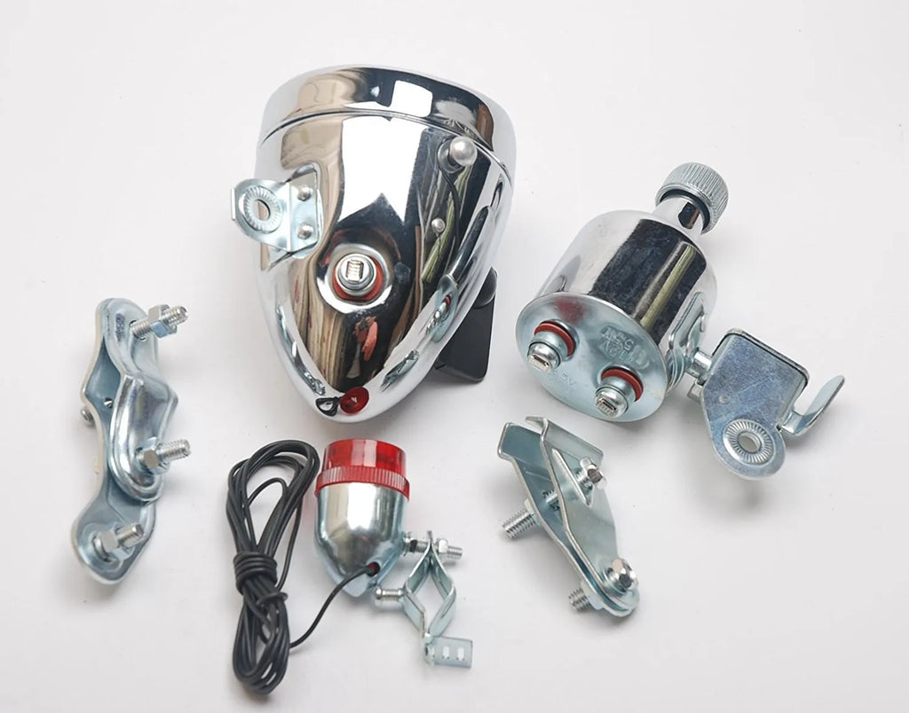 Silver bicycle dynamo generator light modification kit showing mounting bracket and wiring connections