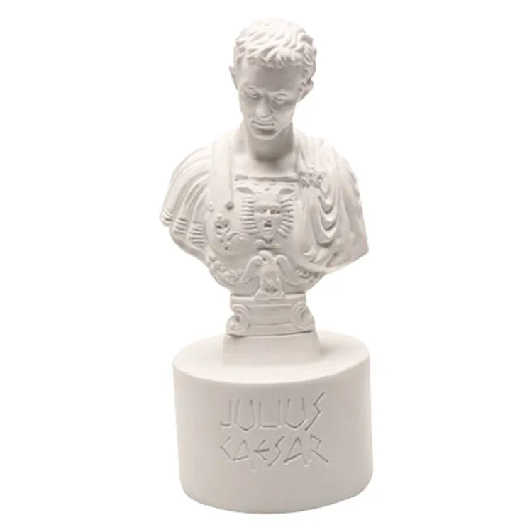 White synthetic resin character model pen holder on a desk.
