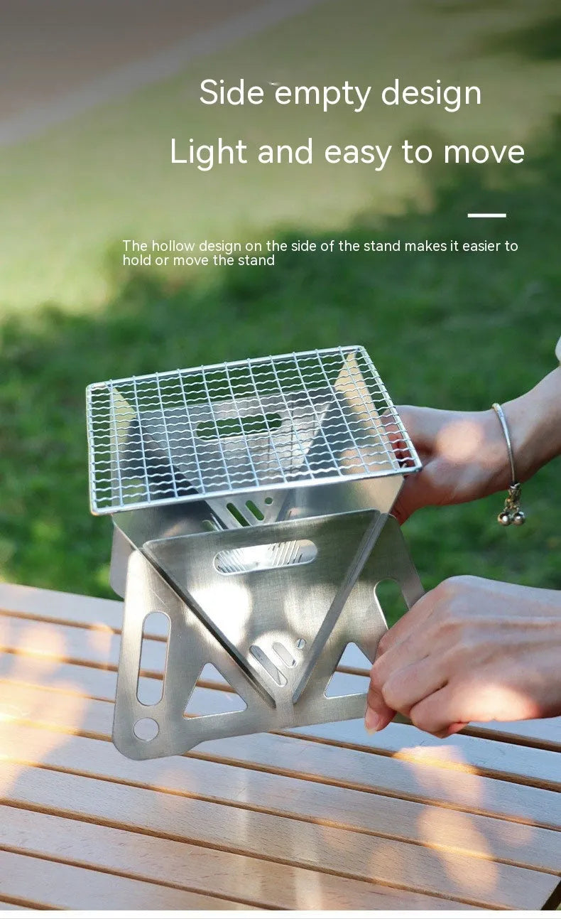 Large stainless steel folding barbecue oven with storage bag, suitable for outdoor grilling.