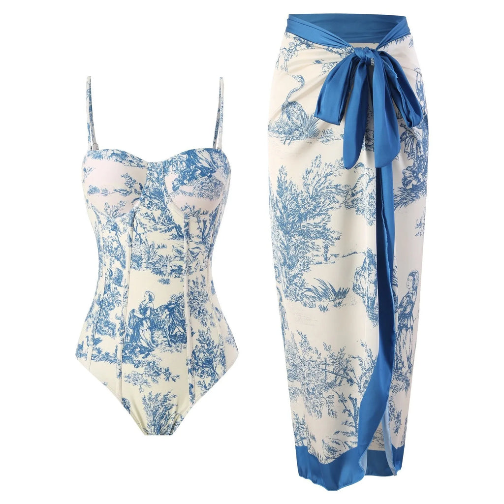 Blue women's one-piece swimsuit with matching gauze skirt on white background