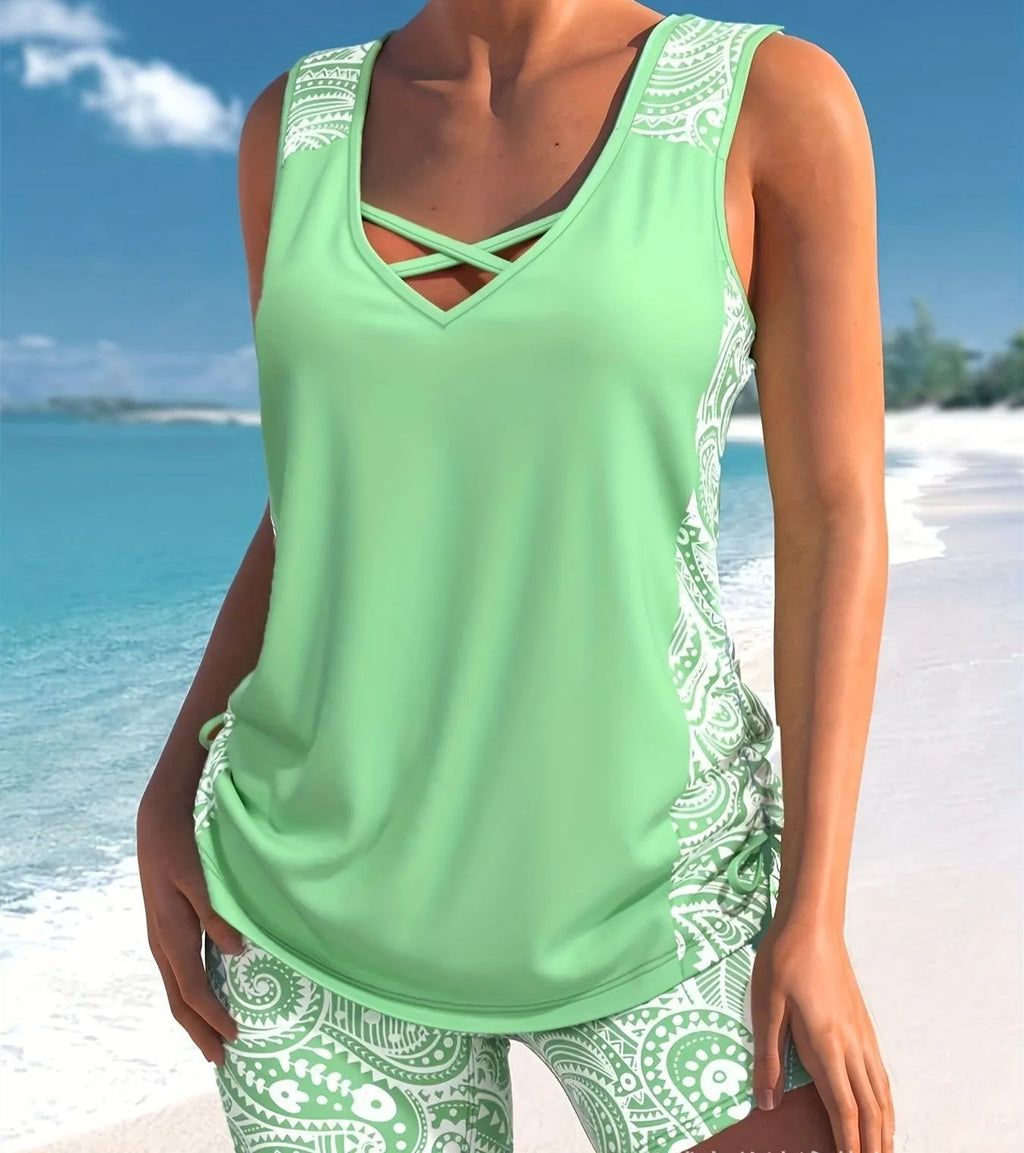 Women's printed split boxer swimsuit set with top and shorts in multiple colours.
