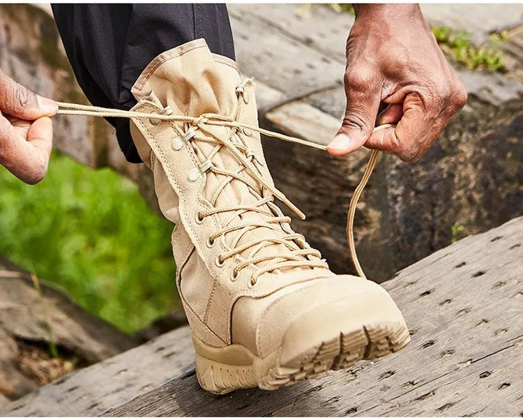 Black and sand coloured Yulong tactical desert combat boots for outdoor climbing and sports.