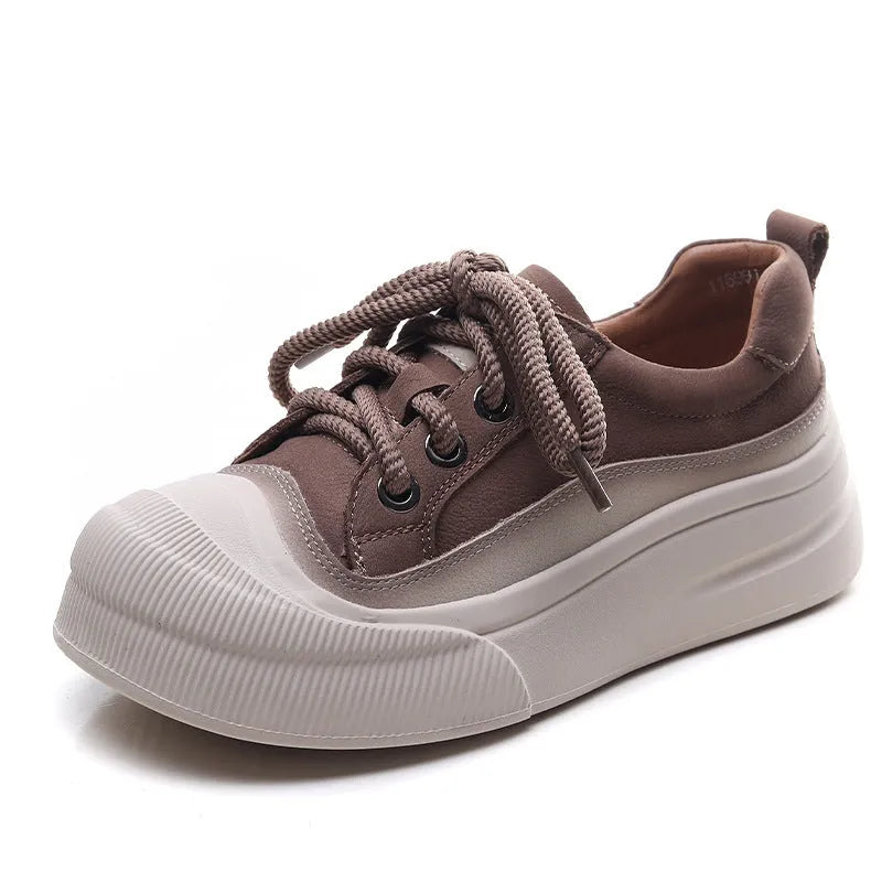 Yellow women's leather lace-up casual shoes with round toe on a plain background.
