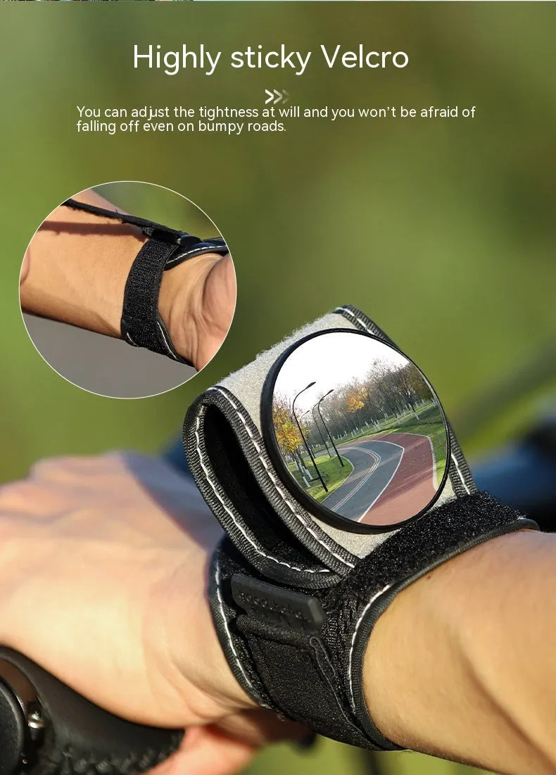Black nylon bicycle wrist-mounted rear-view mirror for cycling safety.