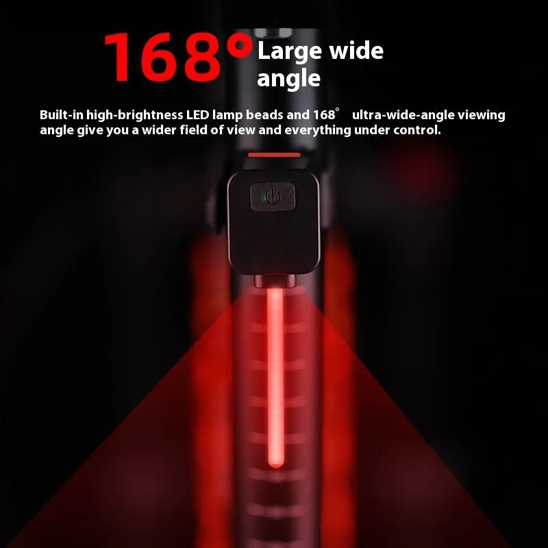 USB rechargeable bicycle running water tail light with silicone strap mount on a bike seat tube.