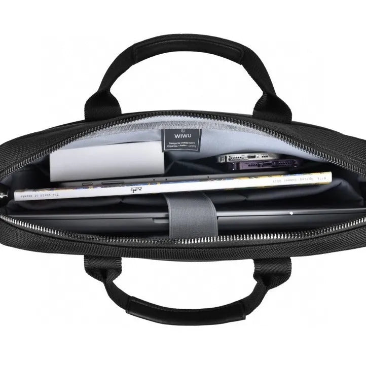 Black Oxford cloth laptop rucksack showing multi-pocket interior and separate computer compartment for 14 or 15.6 inch devices.