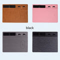 Pink wireless charging mouse pad with phone holder on a desk, showing USB cable and 320mm x 260mm size.