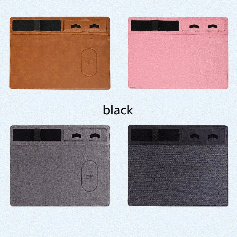 Pink wireless charging mouse pad with phone holder on a desk, showing USB cable and 320mm x 260mm size.