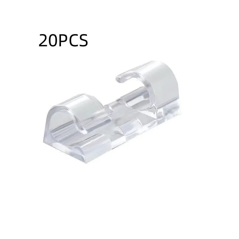 Transparent self-adhesive plastic cable clips in small, medium, large, and extra large sizes for wire management.