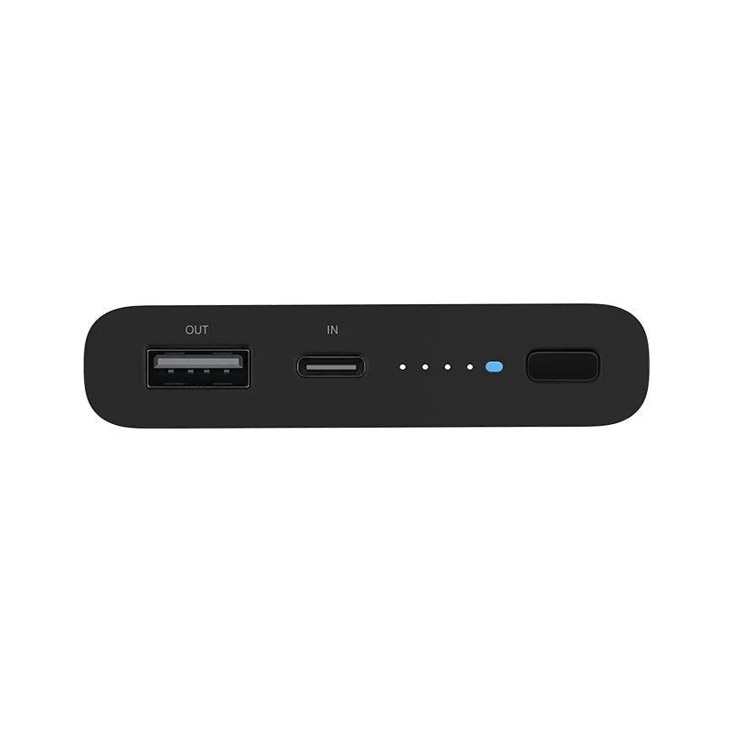 White and black large capacity 10000mAh power bank with USB Type-C port and wireless charging pad.