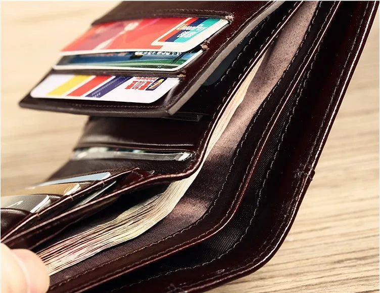 Men's leather wallet in black or brown with banknote folder, card slots, coin pocket, and photo window