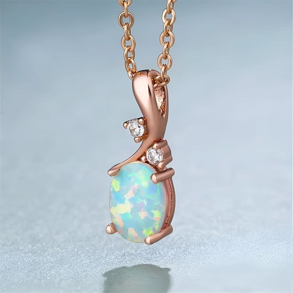 Water drop opal pendant on an adjustable alloy chain necklace in rose gold colour