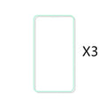 Luminous tempered glass screen protector for iPhone glowing softly in a dark setting.