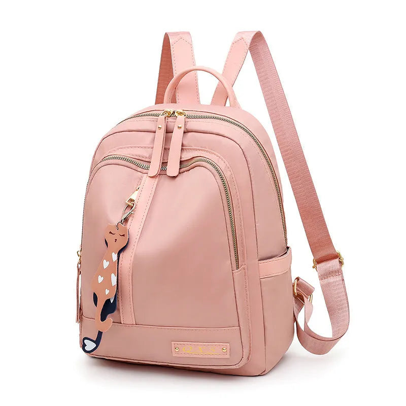 Women's soft nylon casual backpack in black colour with double shoulder straps and external pockets
