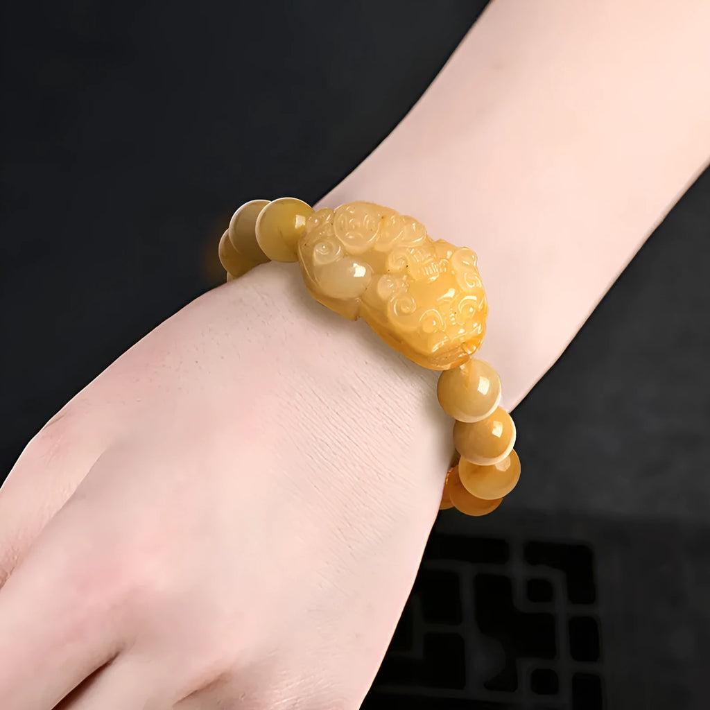 Carved Jinsi Jade money bracelet with golden thread patterns in two size options