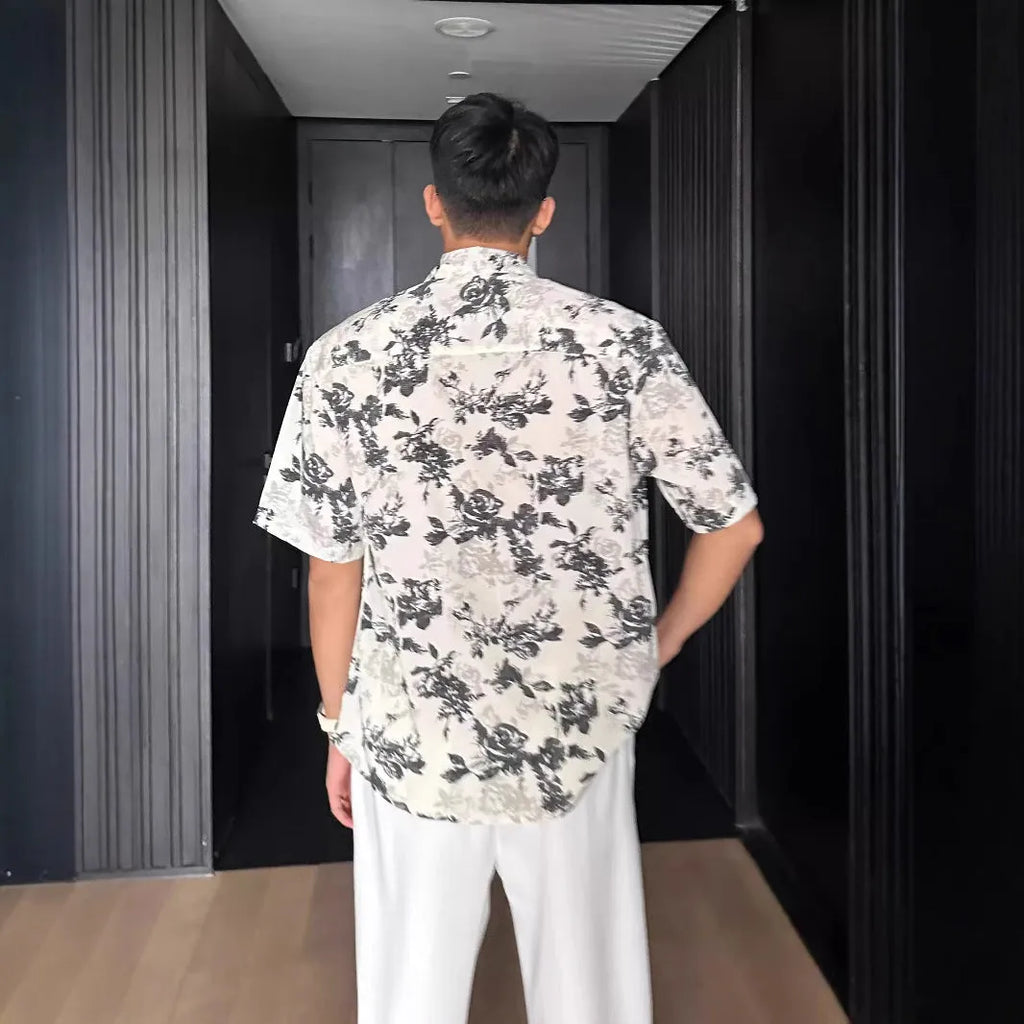 Printed floral short sleeve shirt in loose casual pendant style available in white and black colours