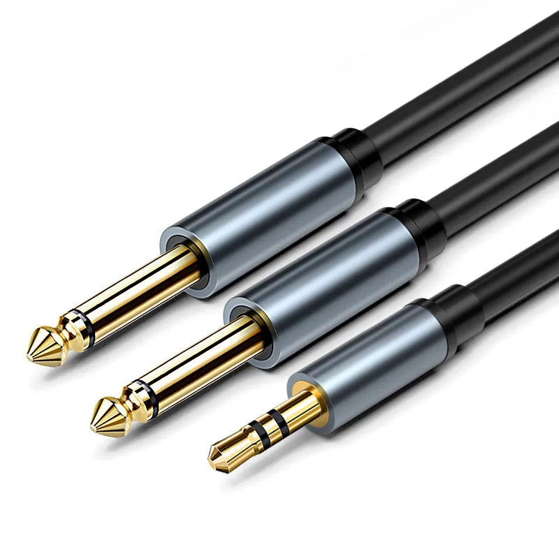 3.5mm stereo to two 6.5mm male audio cable with gold-plated connectors on a black background