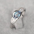 Geometric ellipse women's ring with zircon inlay in white gold colour plating