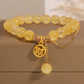 Natural citrine bracelet with Chinese character tassels in electroplated mixed materials