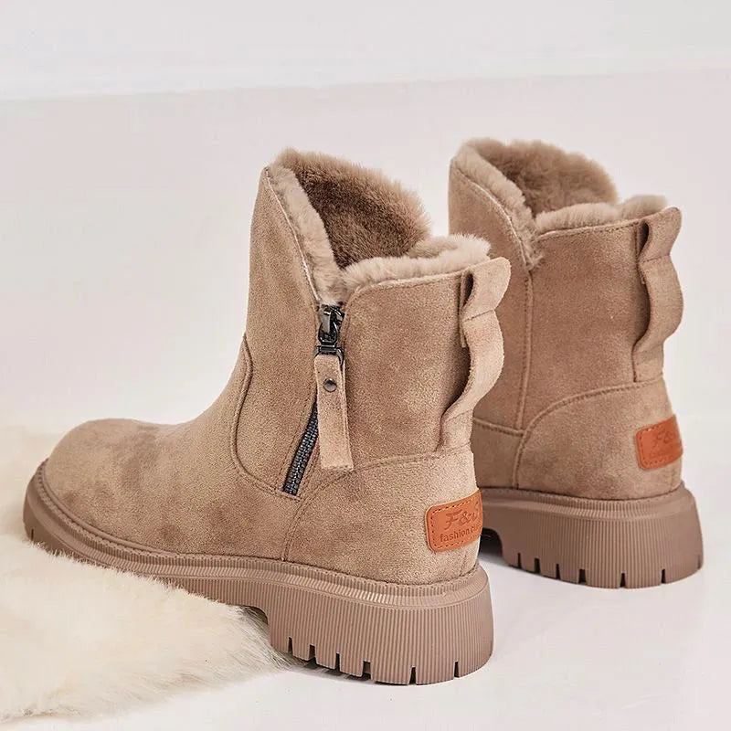 Women's black high-top snow boots with side zipper, plush lining, and non-slip rubber sole