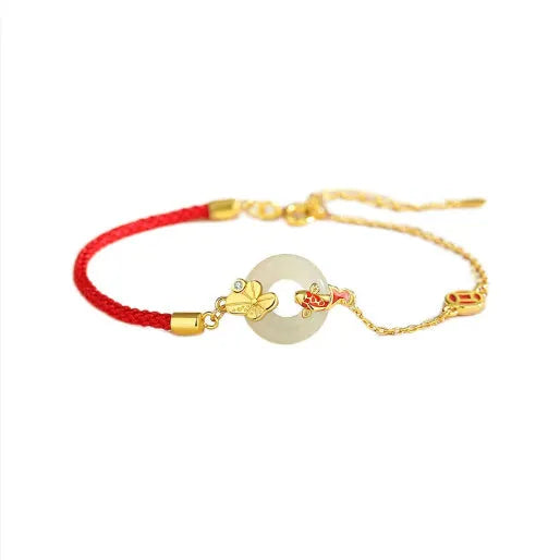 Gold electroplated 925 sterling silver bracelet with red rope and peace buckle featuring koi fish design