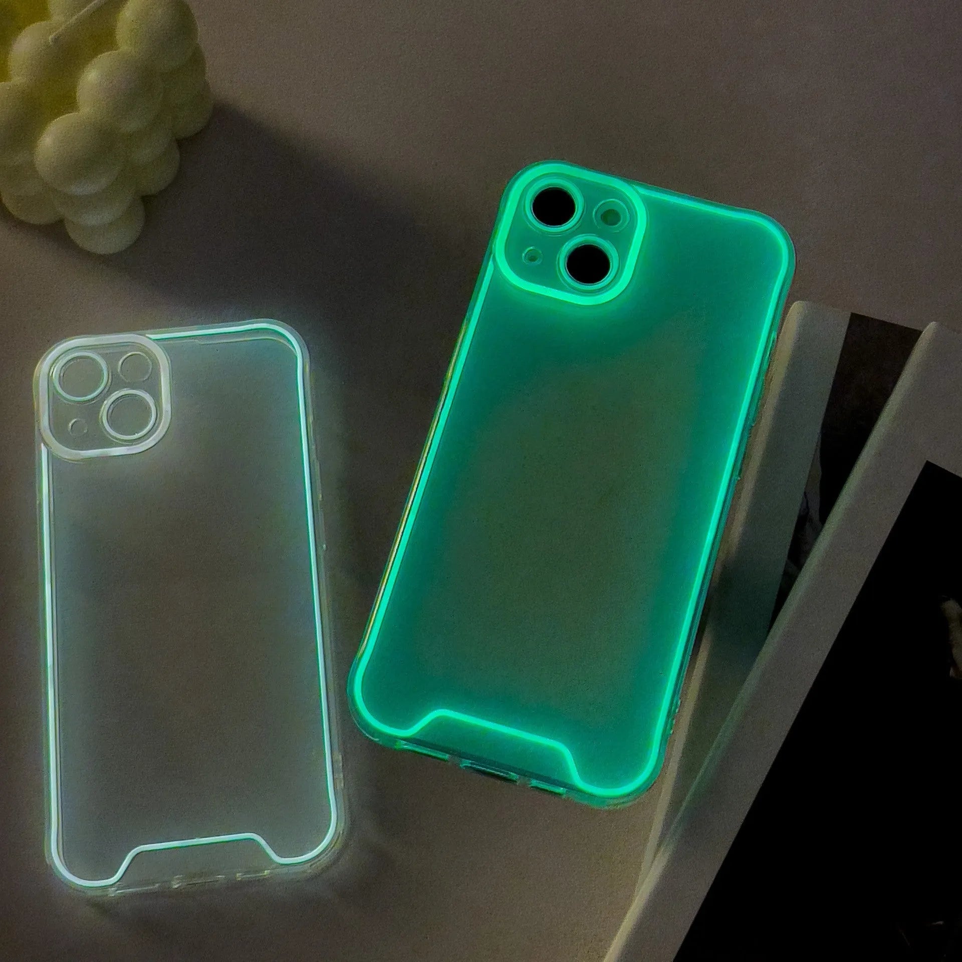 Glow in the dark Christmas themed soft TPU phone case for Apple iPhone, shown in multiple colours.