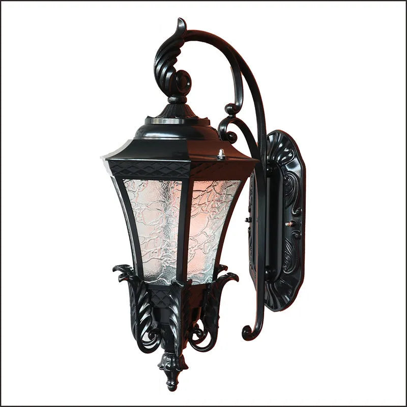 European-style black outdoor wall lamp with solar panel mounted on exterior wall