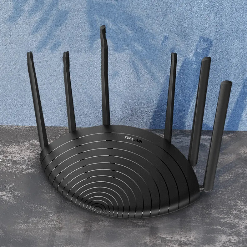 TP-Link TL-WDR7661 AC1900 Gigabit wireless router with compact black design and UK plug