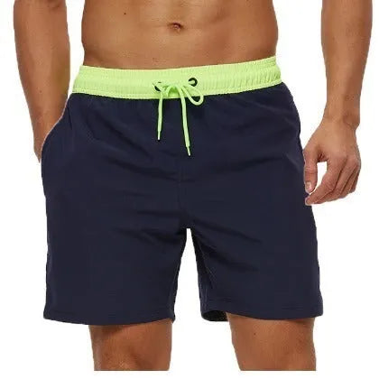Men's blue stitching waist running shorts with a zippered pocket and drawstring.