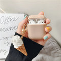 Silicone case for Apple AirPods 2 with cylindrical ice cream swirl design showing charging port cutout