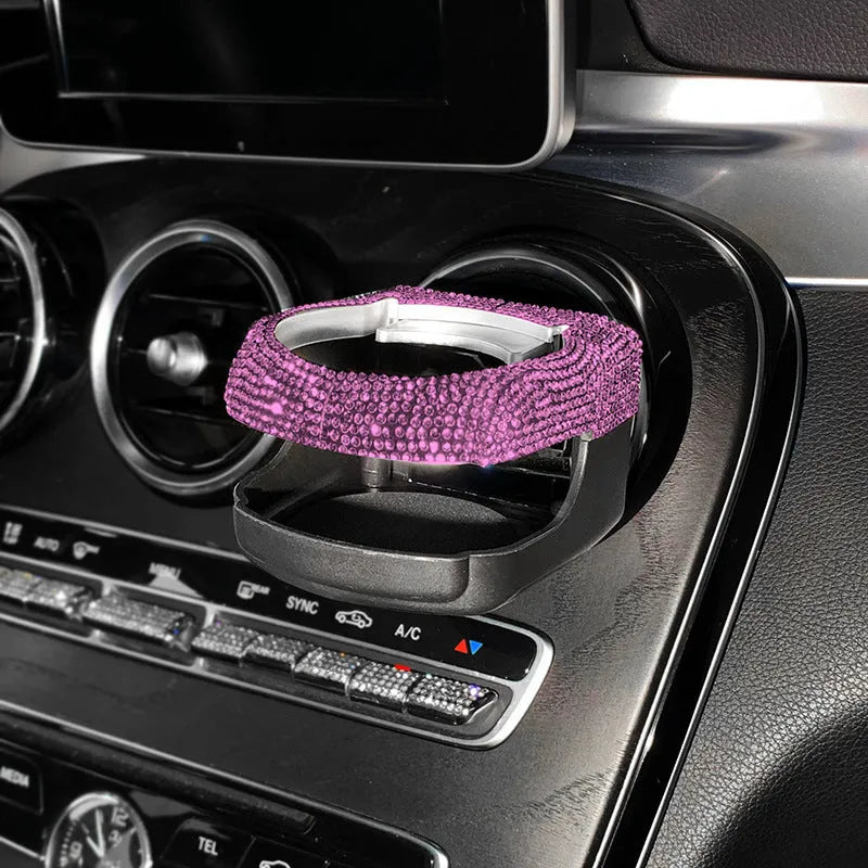 White diamond rhinestone car air vent cup holder bracket showing clip mechanism