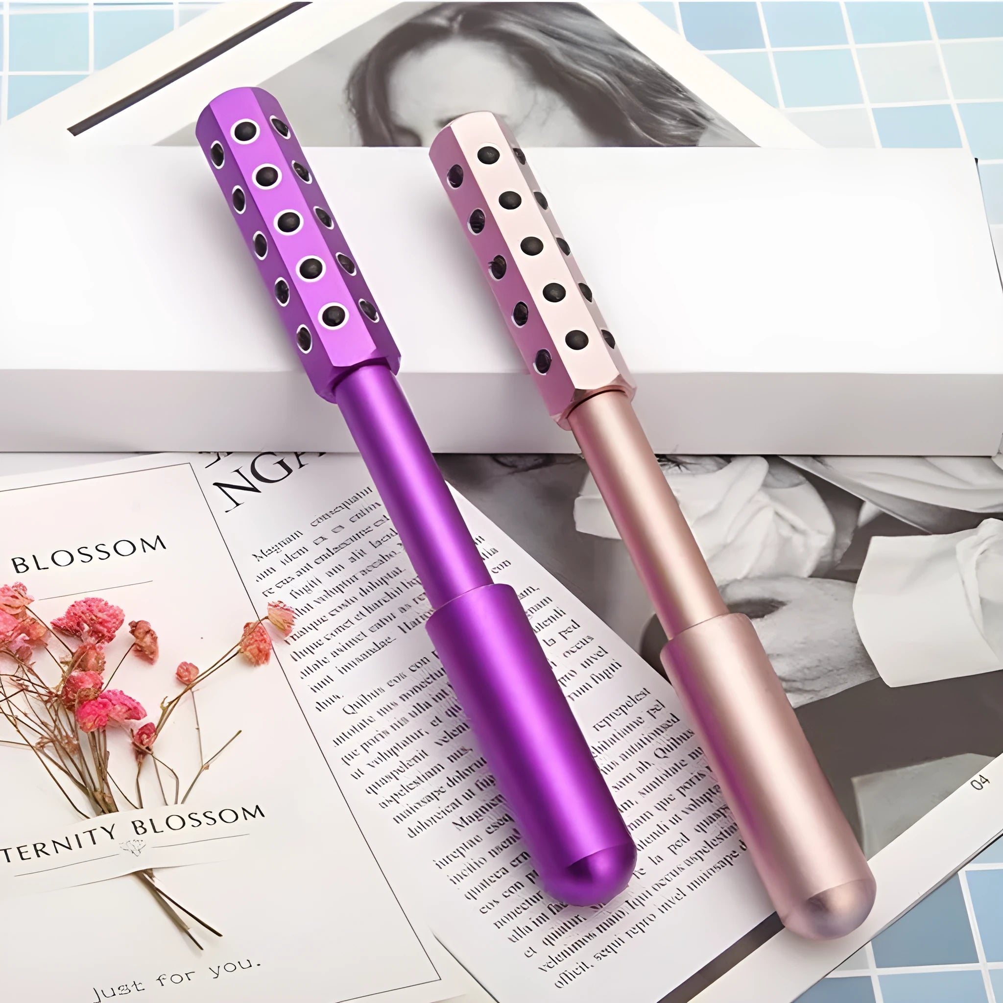 Germanium particles roller beauty massage instrument measuring 193mm long in purple colour