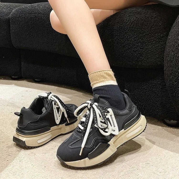 Women's black retro platform sports shoes with lace-up front and rubber sole