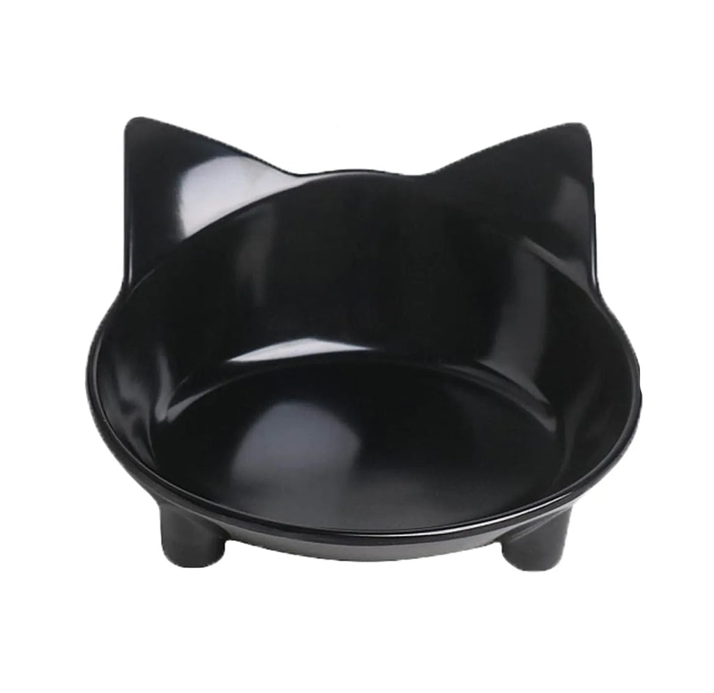 Shallow black melamine cat bowl with non-slip rubber base on a kitchen floor