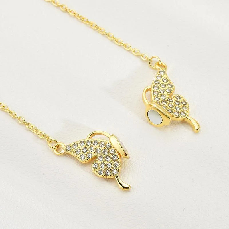 Gold titanium steel clavicle necklace with magnetic snap butterfly charm on twisted chain