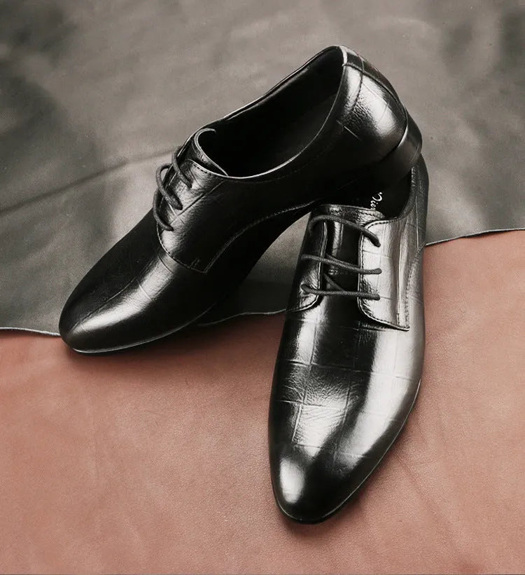 Men's black leather derby shoes with a pointed toe cap and anti-skid rubber sole.