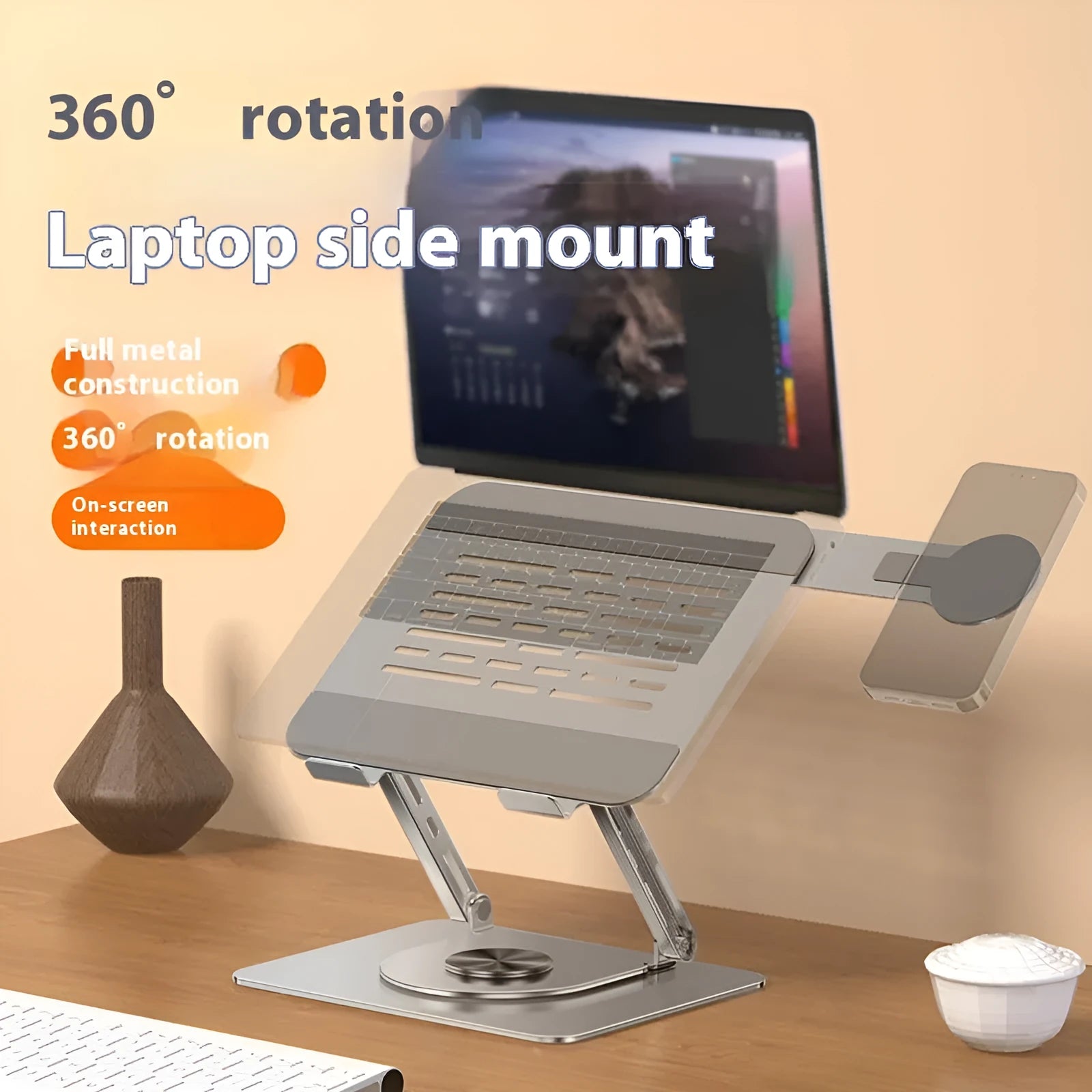 Silver carbon steel laptop stand with side-mounted magnetic phone holder on rotatable base