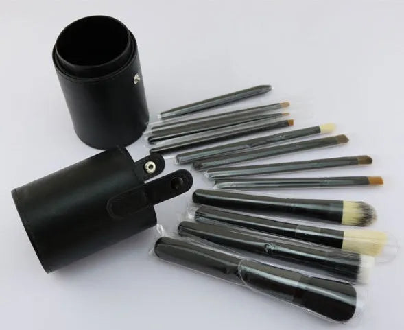 Niya Supply 12-piece makeup brush set in black PU cylinder with assorted wooden-handled brushes