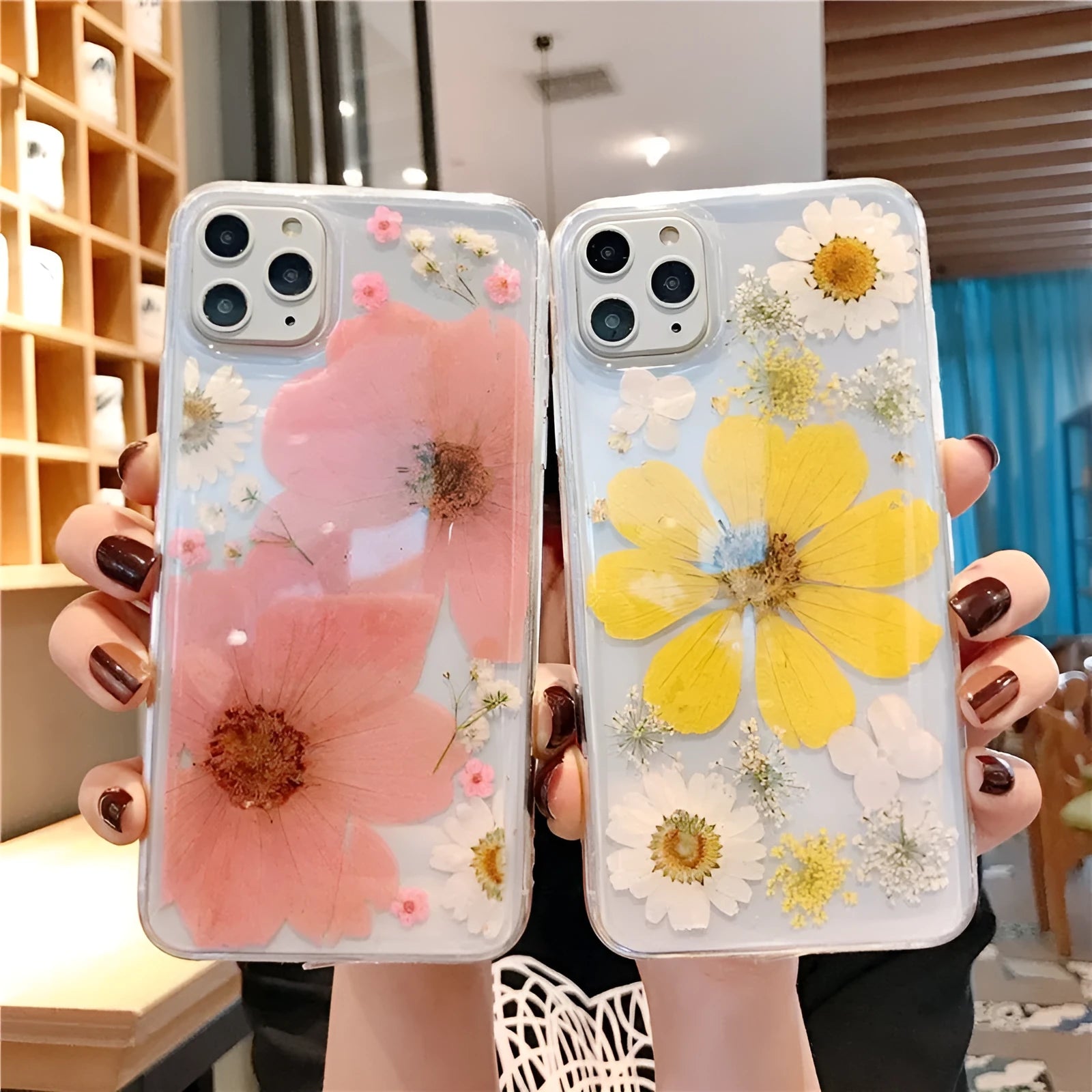 Slim TPU iPhone case with a large pink floral print on the back.