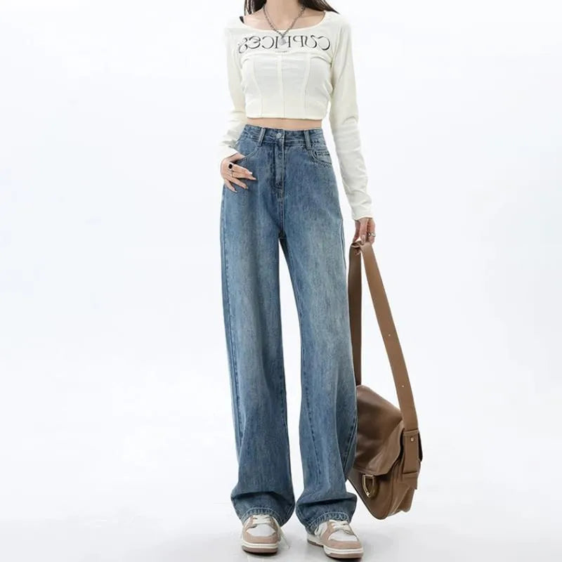 Women's retro blue wide leg jeans with high waist and straight leg silhouette on hanger