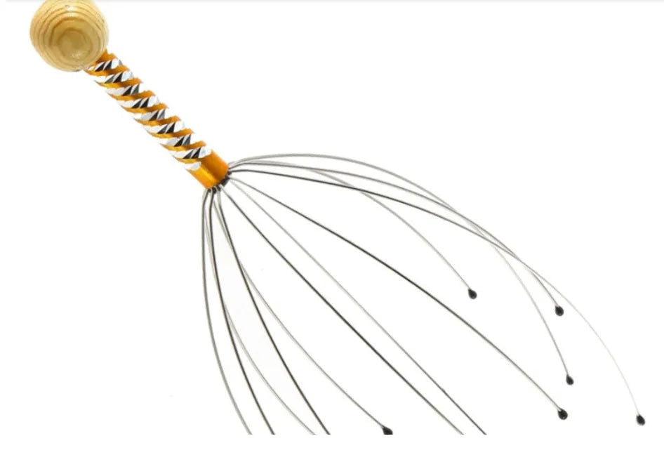 Octopus scalp massager with wooden handle and stainless steel threads on a light background