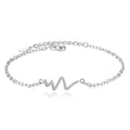 Silver alloy adjustable heartbeat bracelet on wrist for pulse tracking