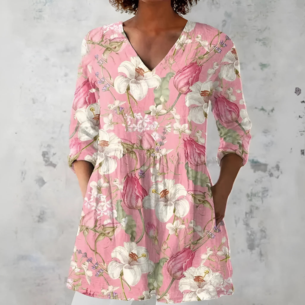 Women's retro slim fit printed long-sleeved top in a floral pattern, showing front view.