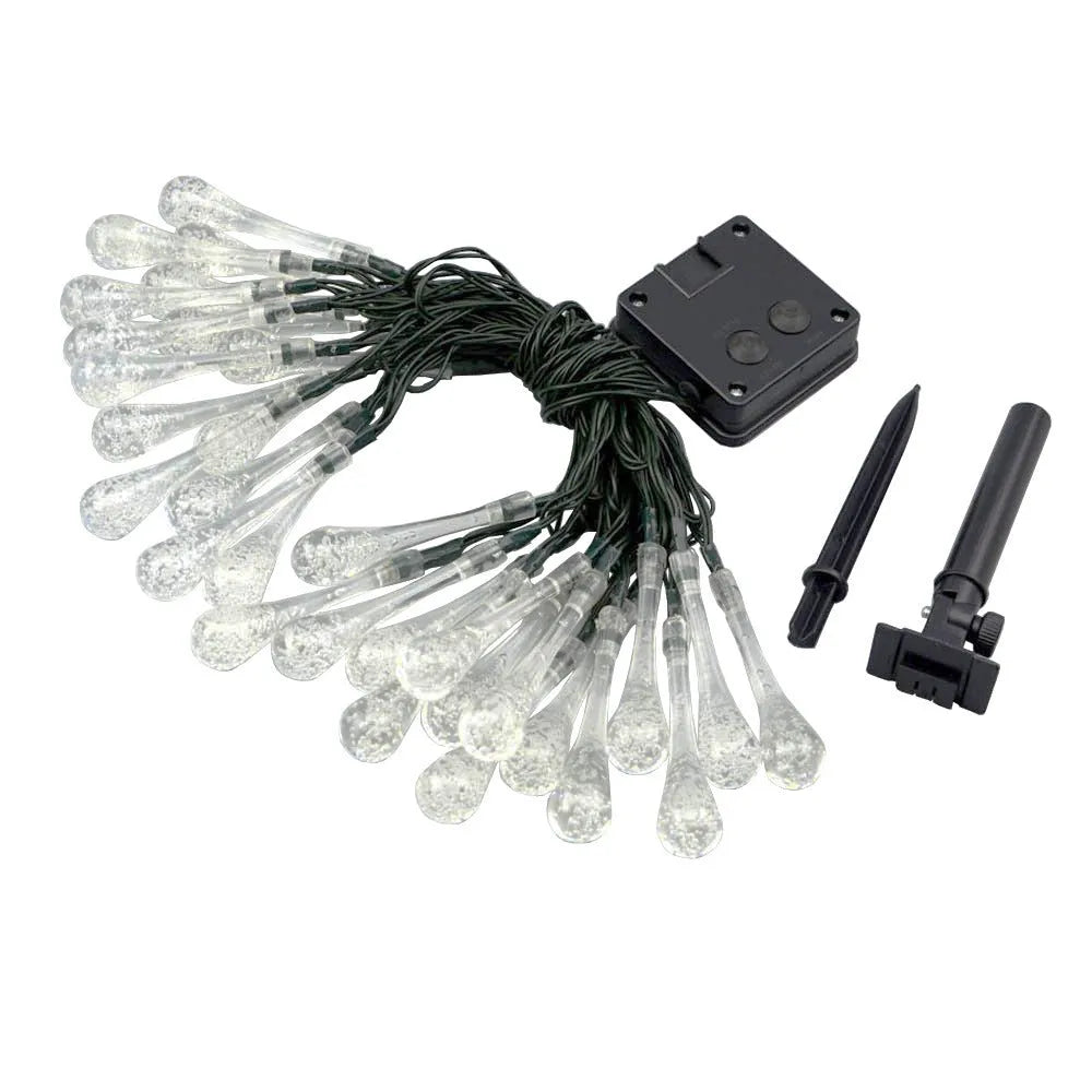 6.5 metre solar LED string lights with bubble drops pendants decorating an outdoor fence