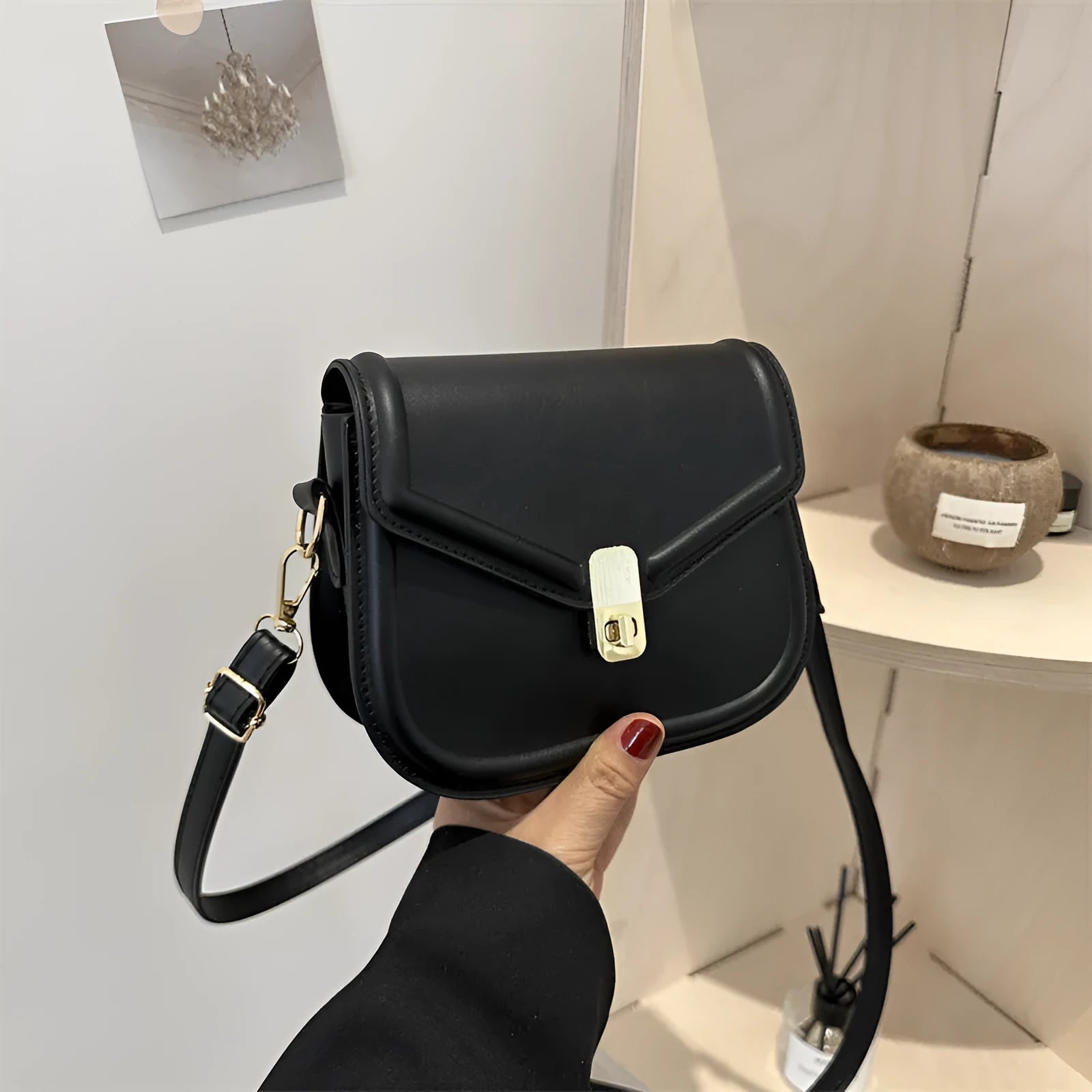 Soft PU leather messenger bag in clam shell design, shown in a horizontal square shape with a shoulder strap.
